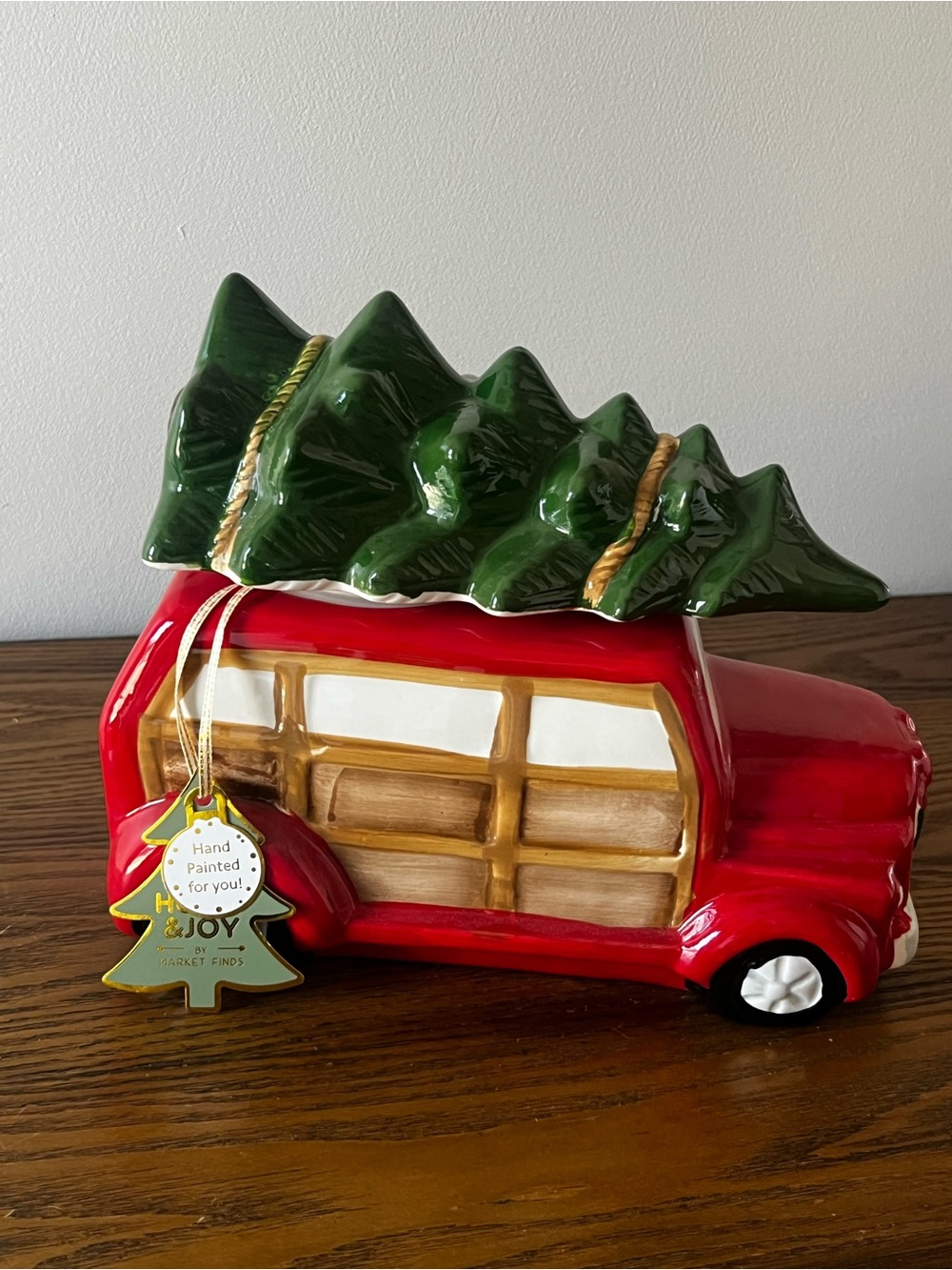 Ceramic holiday Woody station wagon ready to deliver a tree and cookie